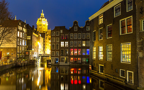 阿姆斯特丹运河尼古拉教堂黄昏的尼瑟兰图片