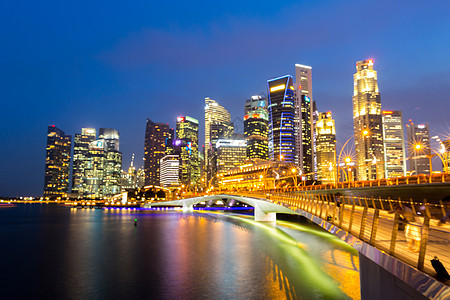 抽象模糊的背景新加坡市中心城市景观与现代天际线城市摩天大楼日落码头湾图片