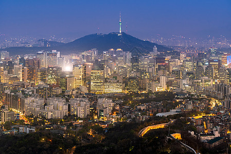 韩国首尔市中心城市景观的空中日落夜景与首尔塔首尔市中心城市景观夜景图片