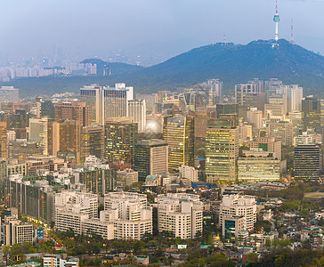 韩国首尔市中心城市景观的空中日落夜景与首尔塔首尔市中心城市景观夜景图片