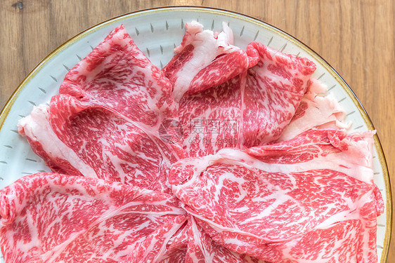 瓦古A5牛肉肉纹理为食品背景图片