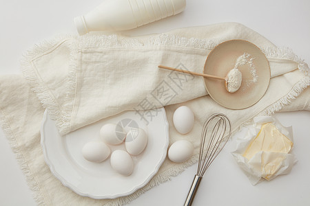 牛奶素材白色桌子上的烘焙配料炊具烘焙的原料背景