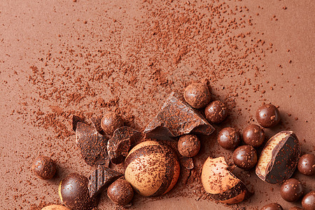 背景美味的巧克力糖果棕色美味的巧克力糖果图片
