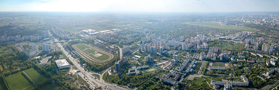 无人机基辅城市基础设施的空中全景城市微型区赛马场体育场街道朱利亚尼基辅希科斯基机场跑道城市娱乐活动区无人机上俯瞰背景图片