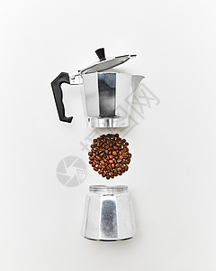 咖啡颗粒的形式,个圆圈个金属咖啡机灰色的背景上,的文字煮咖啡的平躺金属咖啡机咖啡豆的图案,灰色图片