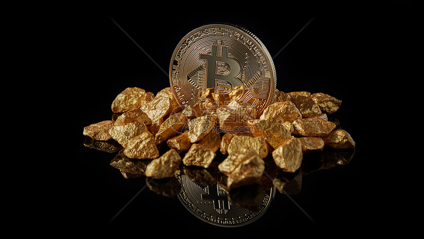 黄金比特币黄金块代表世界趋势,两者孤立黑色反射表背景数字黄金为贵金属比特币加密货币融资的比特币硬币加密货图片