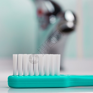 牙科保健健康绿色牙刷浴室的水槽,水龙头背景图片