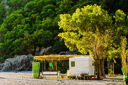 旅游度假旅游希腊阳光海滩上的商队拖车阳光海滩的拖车图片