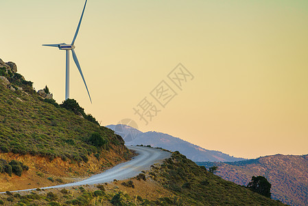 希腊山丘上的风车风电场,欧洲可再生绿色能源的来源生态学希腊山上的风车图片