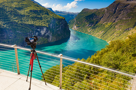 旅游假日图片旅游专业相机三脚架上拍摄来自Geiranger峡湾景观的照片,Ornesvingen观看挪威斯堪的图片