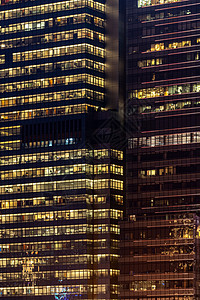 商务中心办公楼的城市抽象窗立,夜间反射颜色香港中国图片