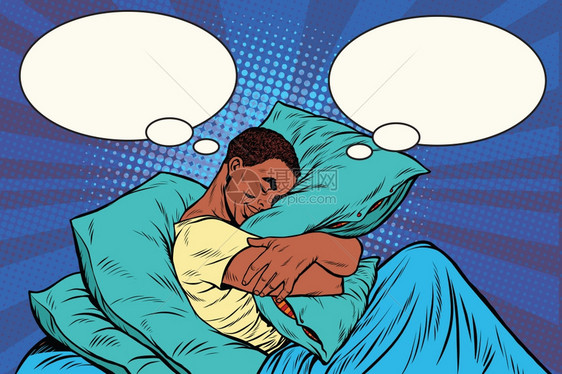 床上做梦的非裔男子图片
