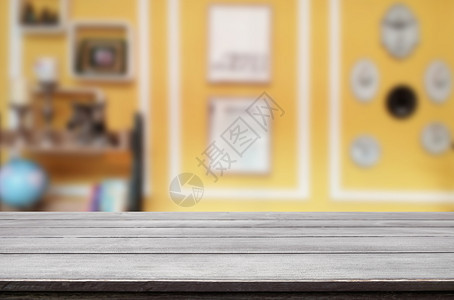 棕色木制桌和咖啡店模糊带有bokeh图像用于照片更新或产品显示图片