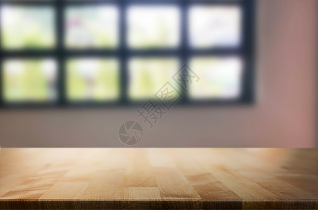 在背景模糊的客厅前木板空桌间平台可用于显示或补装产品模拟显示产品图片