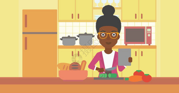 在厨房做蔬菜沙拉的非裔女人图片