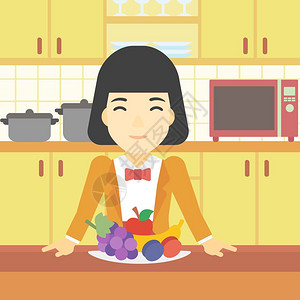 可食用的一个站在餐桌前的亚洲女人设计图片