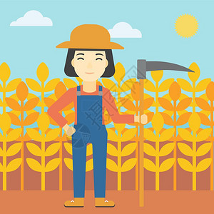 小麦田背景的年轻农民图片