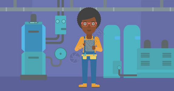 锅炉房里记录供暖系统的非裔女工程师图片