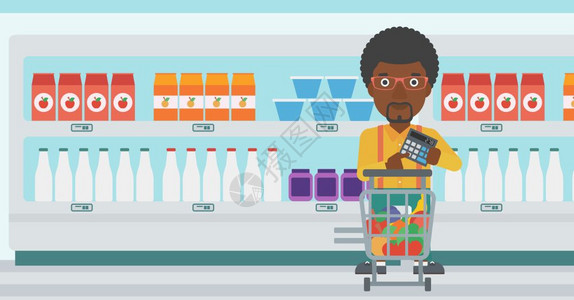 一名在超市满载产品持有计算器的非裔男子图片