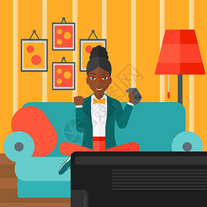 坐在客厅的沙发上打游戏的非裔女孩图片