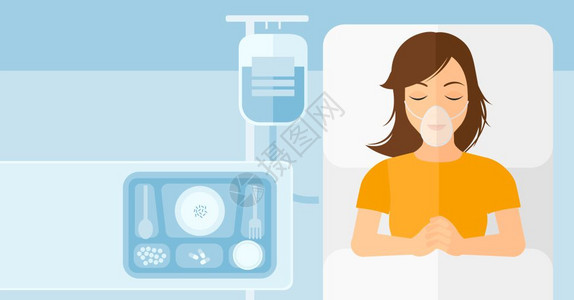 一名躺在医院床上带着氧气面罩的女病人图片