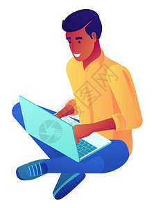 年轻商人坐在交叉腿上用笔记本电脑图片
