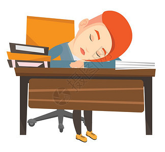 疲劳的学生睡在书桌旁图片