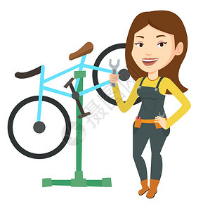 城市天在自行车间工作的天主教妇女修自行车的技术员修自行车的机械师