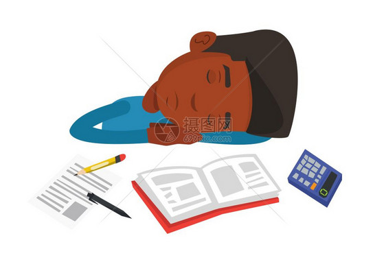 疲劳的非洲学生睡在书桌边图片