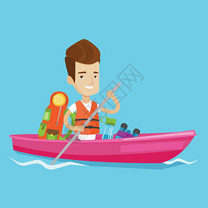 坐在一条皮艇上旅行的年轻男子图片