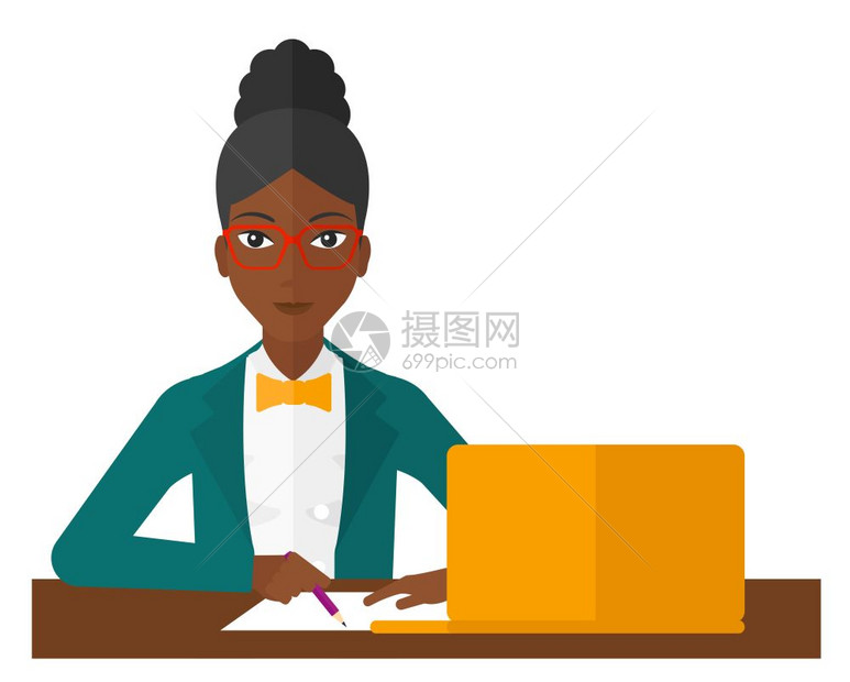 一名妇女坐在笔记本电脑前图片