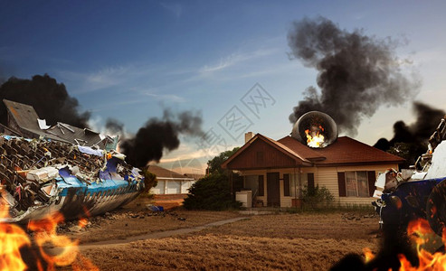 燃烧的飞机坠毁在房子旁边图片