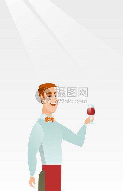 年轻酒保手握着一杯葡萄酒图片