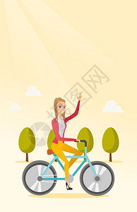在公园里骑自行车的女运动员图片