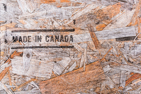 回收的压缩木屑板背景回收的木制材料背景图片
