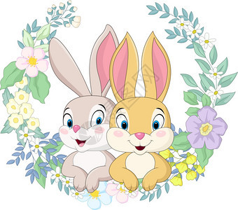 鲜花背景的一对幸福夫妇兔子图片