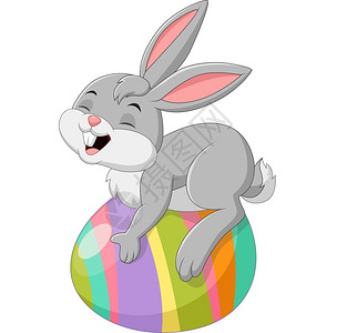 带复活节鸡蛋的卡通小兔子图片