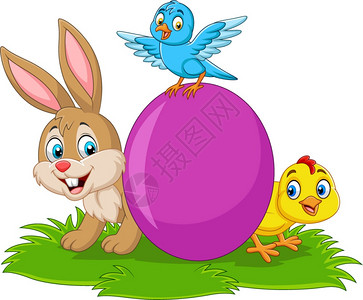 卡通兔子小鸡青鸟和蛋在草地上图片