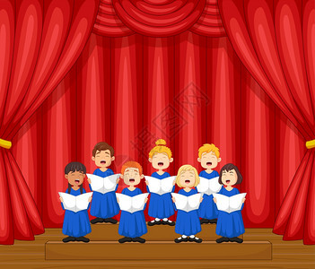 唱诗班儿童在舞台上唱一首歌图片