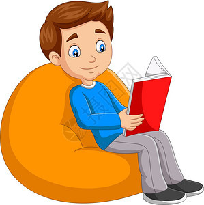 年轻男孩在看书坐大枕头上图片