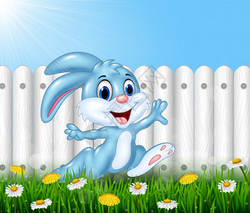 快乐的小兔子在花园里奔跑图片