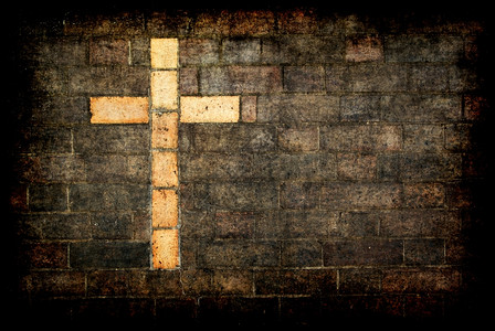 圣建在砖墙上圣建在砖墙上作为背景图片