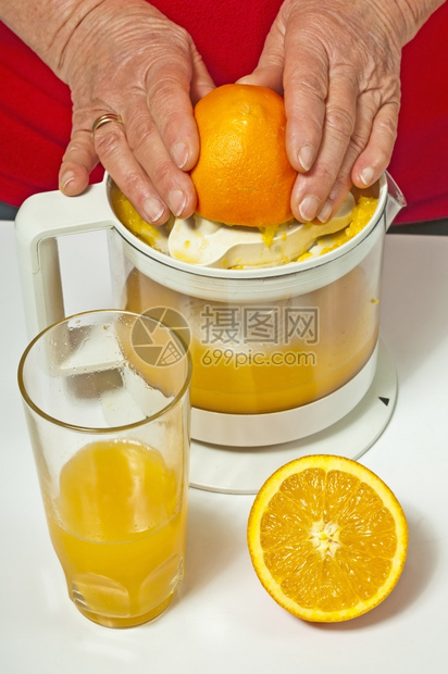 橙汁加挤压器图片
