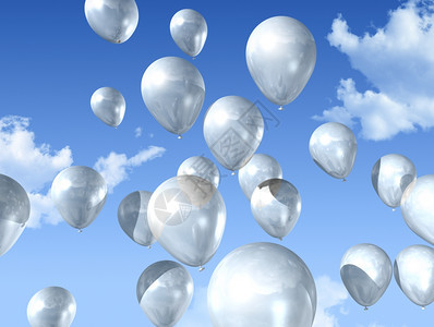 白气球漂浮在蓝色天空上图片