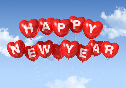 新年红心形气球漂浮在蓝色的天空中新年心形气球快乐背景图片