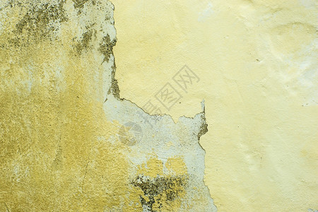 混凝土墙壁上涂有被破坏的层图片