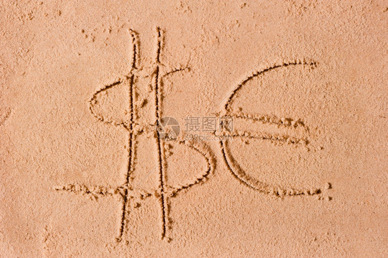 以沙砂抽取的美元和欧符号图片