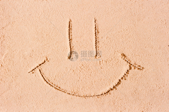 湿沙上笑脸图片