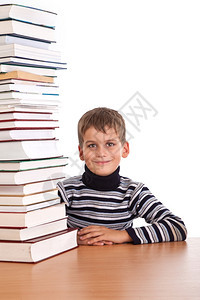 小男孩和一堆书背景图片