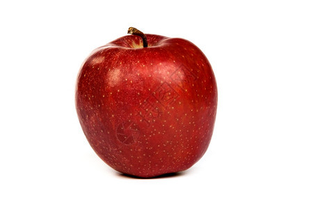 白色背景的闪亮红苹果图片